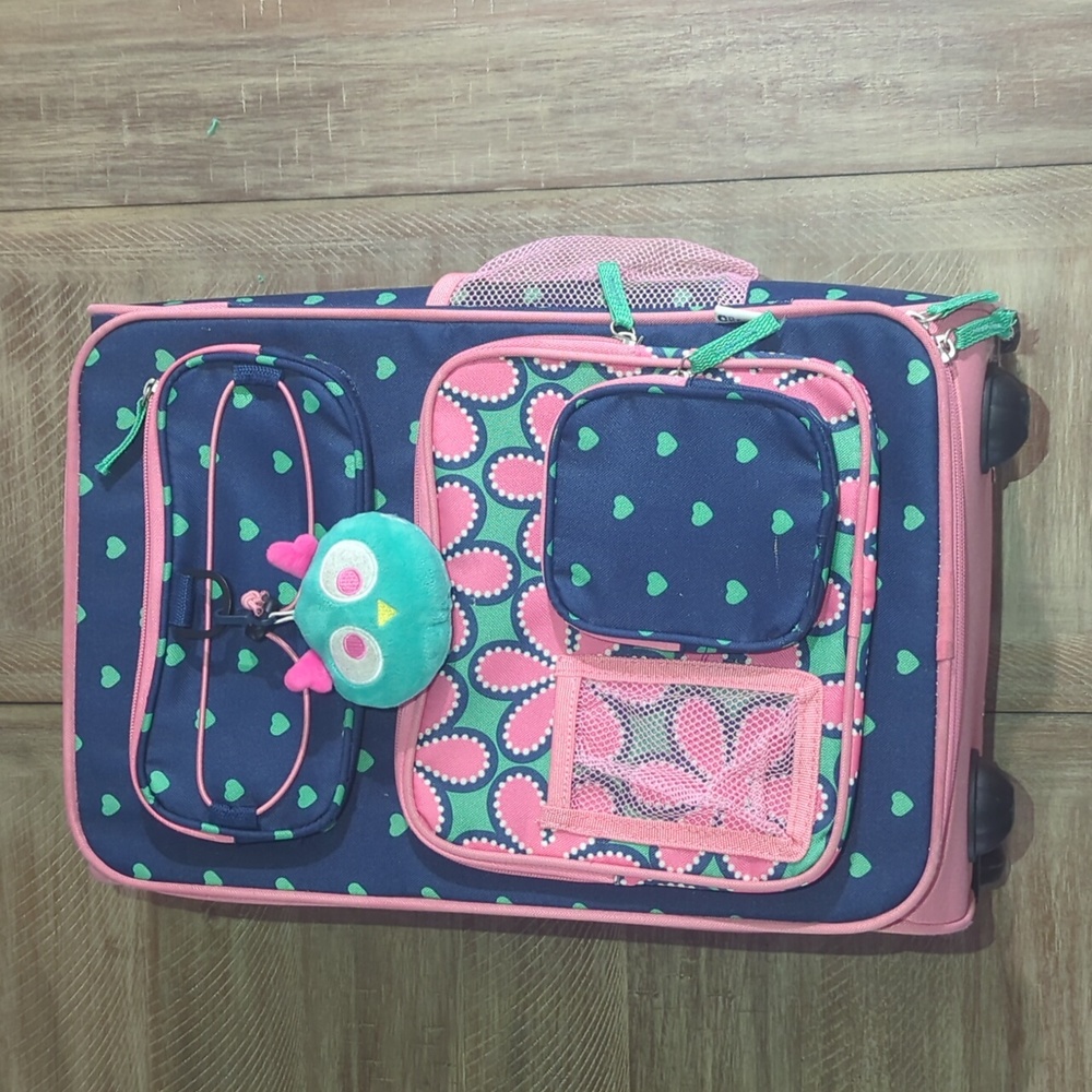 Target Kid's Suitcase. Navy blue exterior, teal heart design, pink detailing.